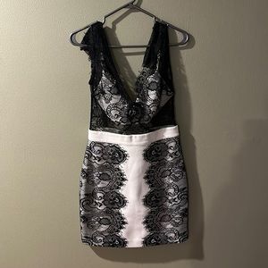 BEBE Knee length lady black and white dress